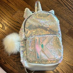 Backpack .Justice little girls unicorn backpack with K on it